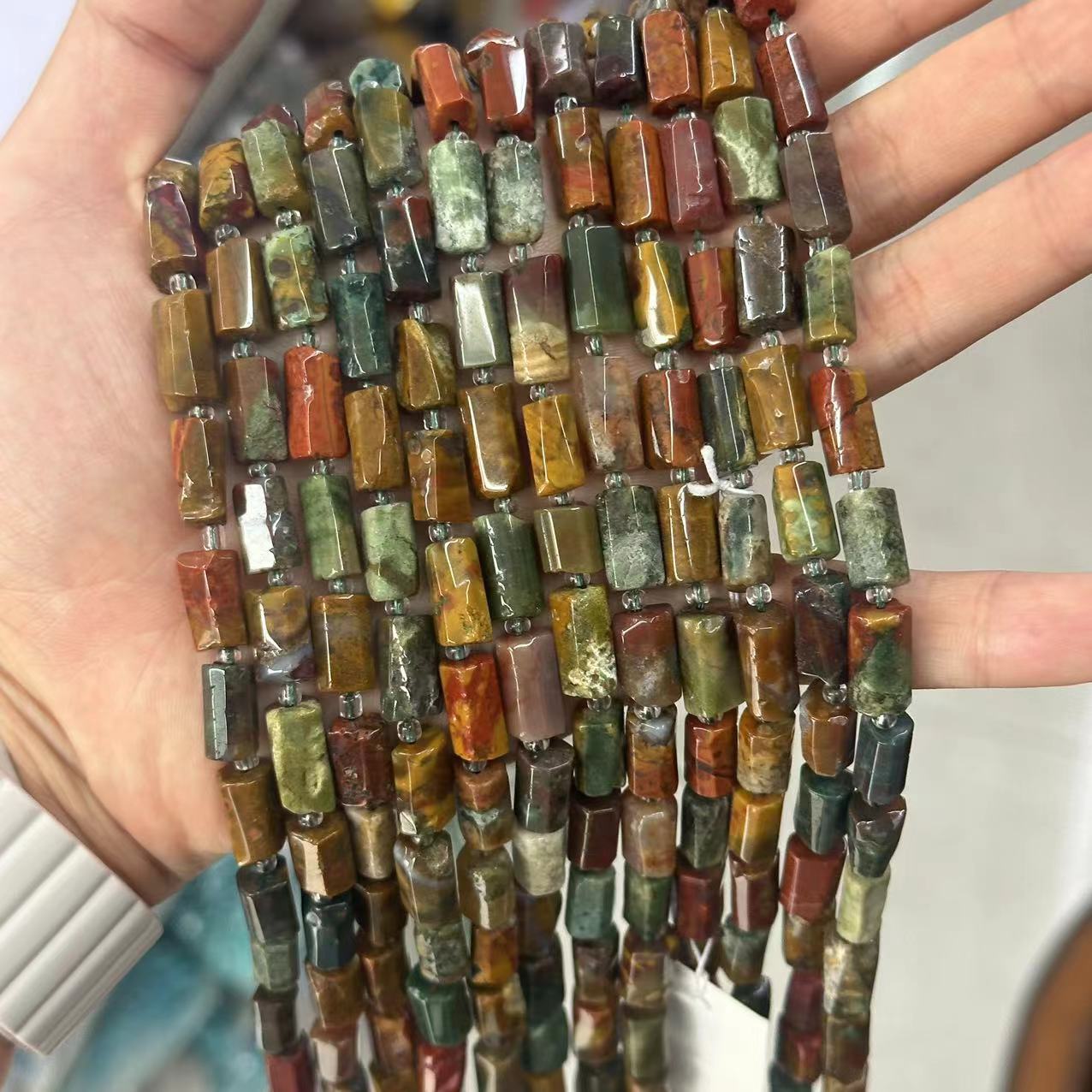 Ocean agate is about 7*11mm (small capsules, gloss