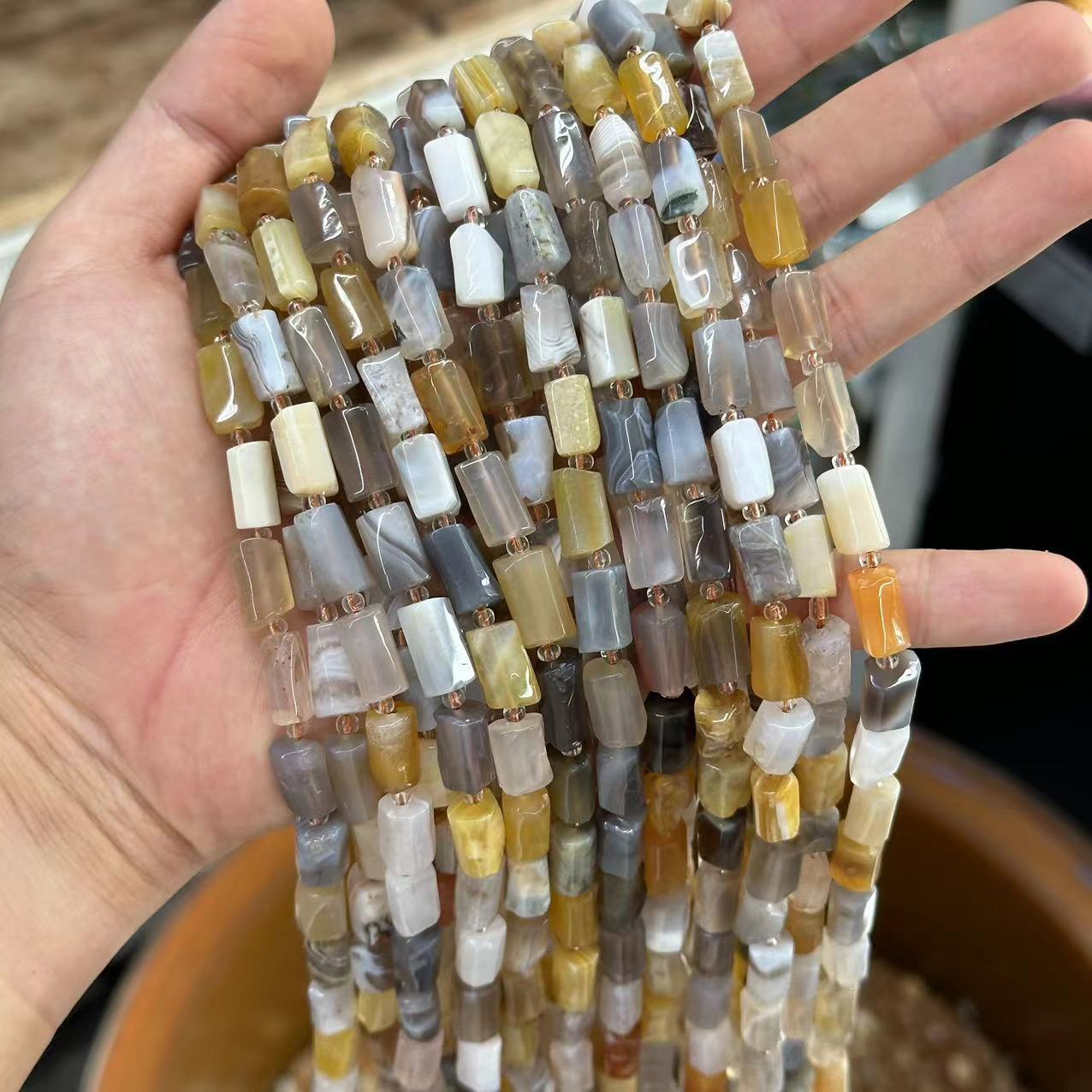 51:Yellow persian agate is about 7*11mm (small capsules, glossy)