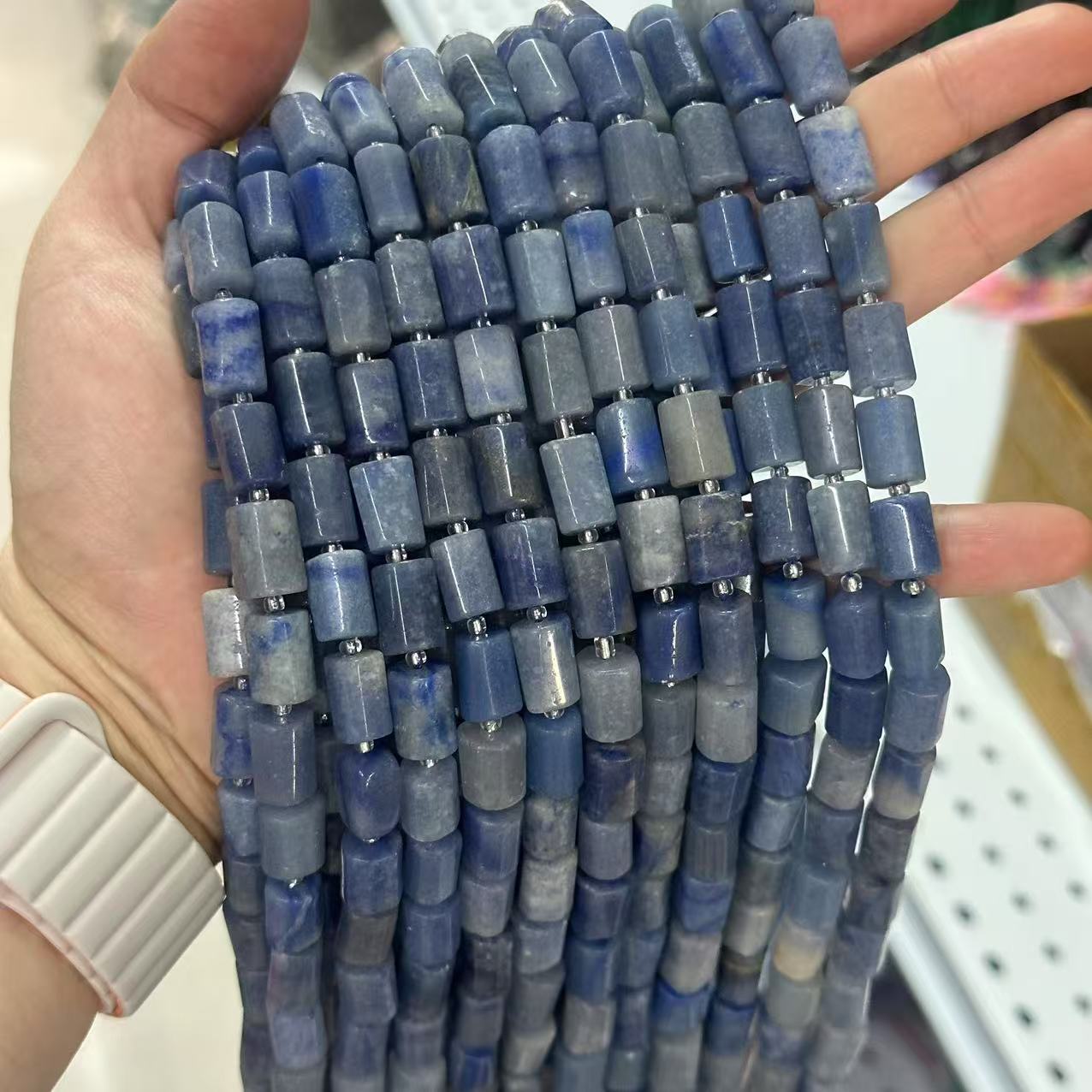 61:Blue aventurine is about 8*12mm (small particles, smooth surface)