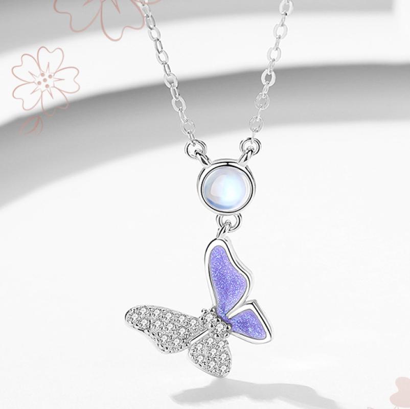 9:D0859 butterfly embracing necklace (white gold)