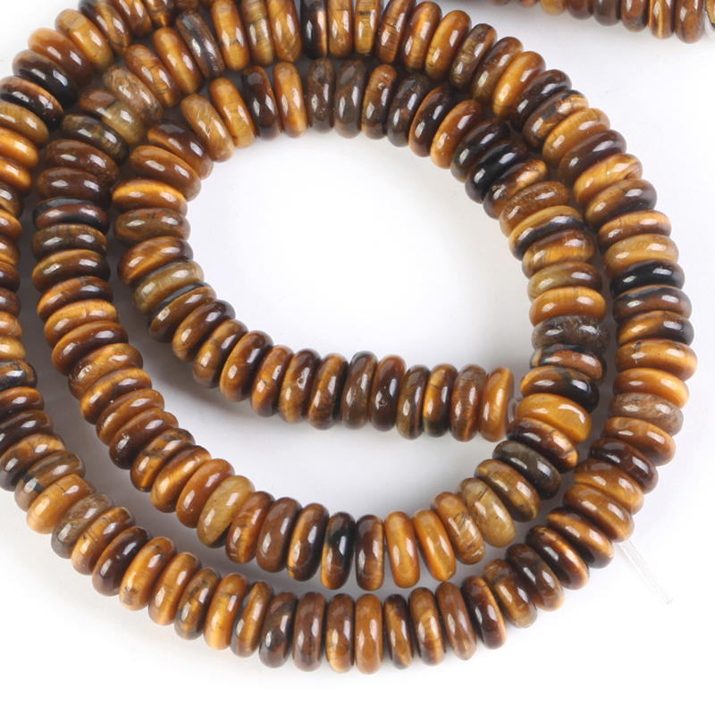 24:2x6mm round yellow Tiger Eye