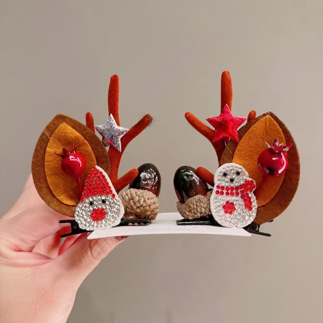 28:1-10# point drill old man snowman pine cone brown antler clip