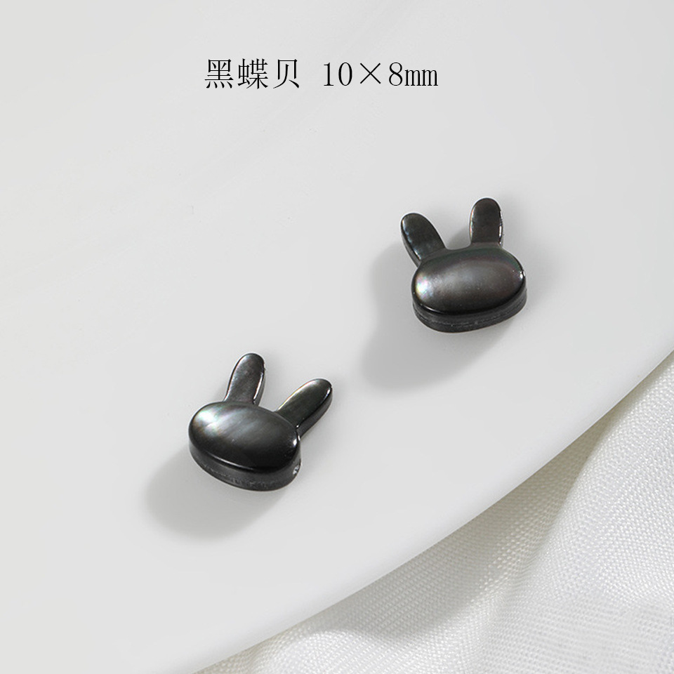 6:Rabbit Black Butterfly Shell-Carved 10 × 8