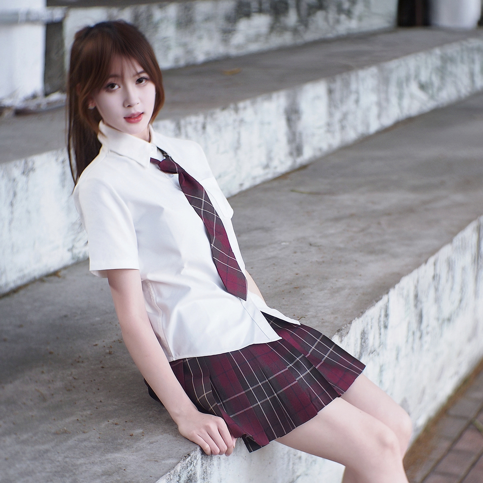 Tr shirt   red plaid skirt   tie