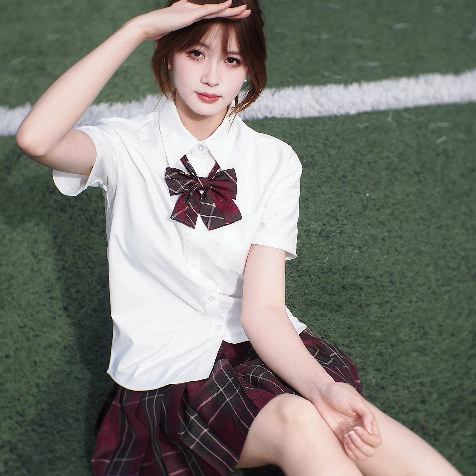 Tr shirt   red plaid skirt   bow tie