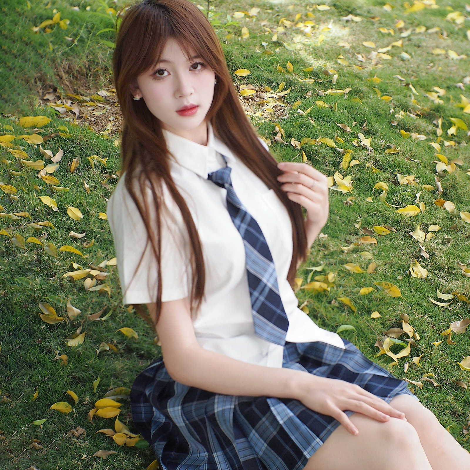 Tr shirt   blue plaid skirt   tie