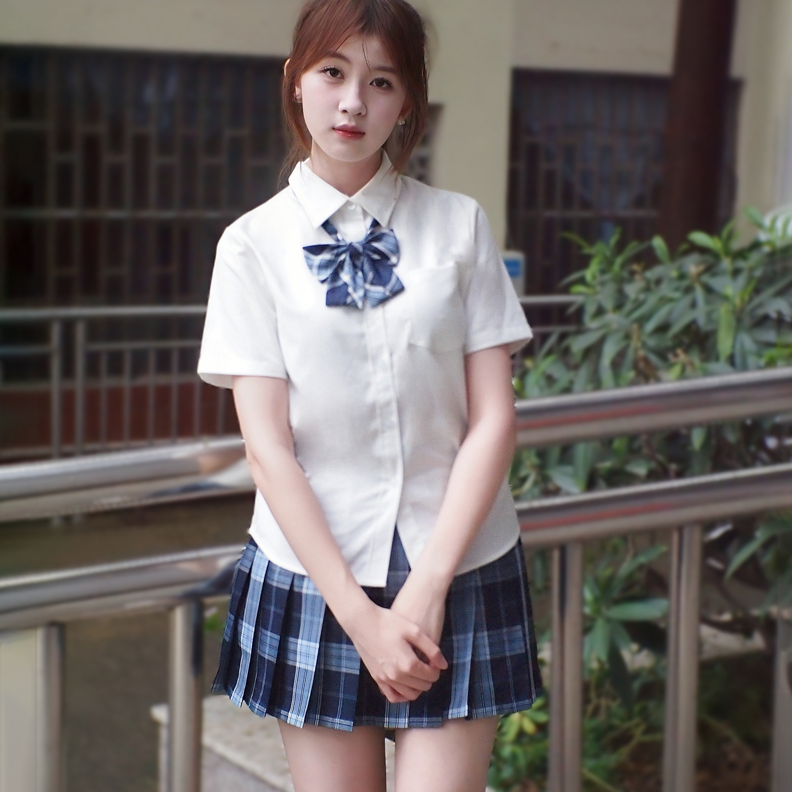 Tr shirt   blue plaid skirt   bow tie