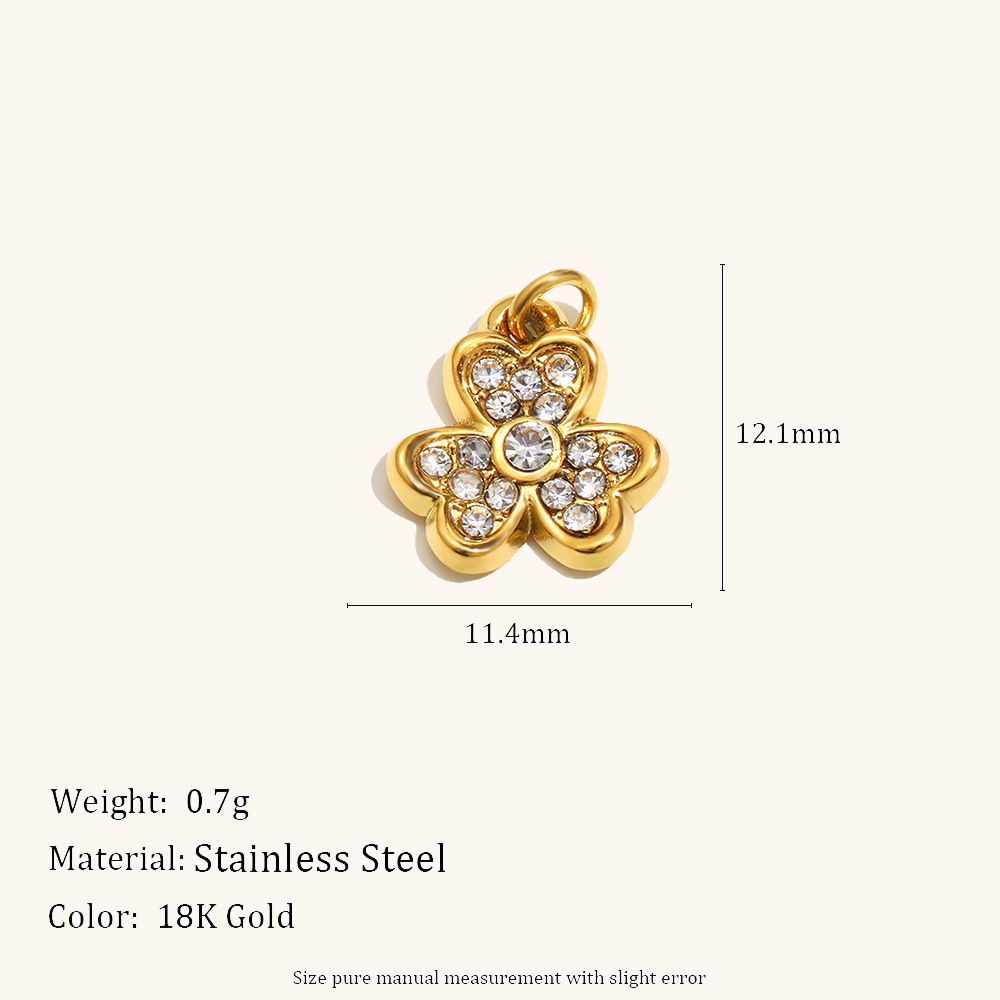 Zircon flower pendant - gold