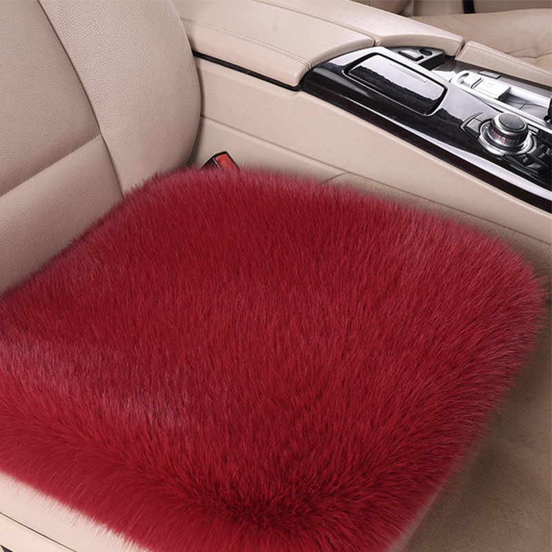 A burgundy single seat