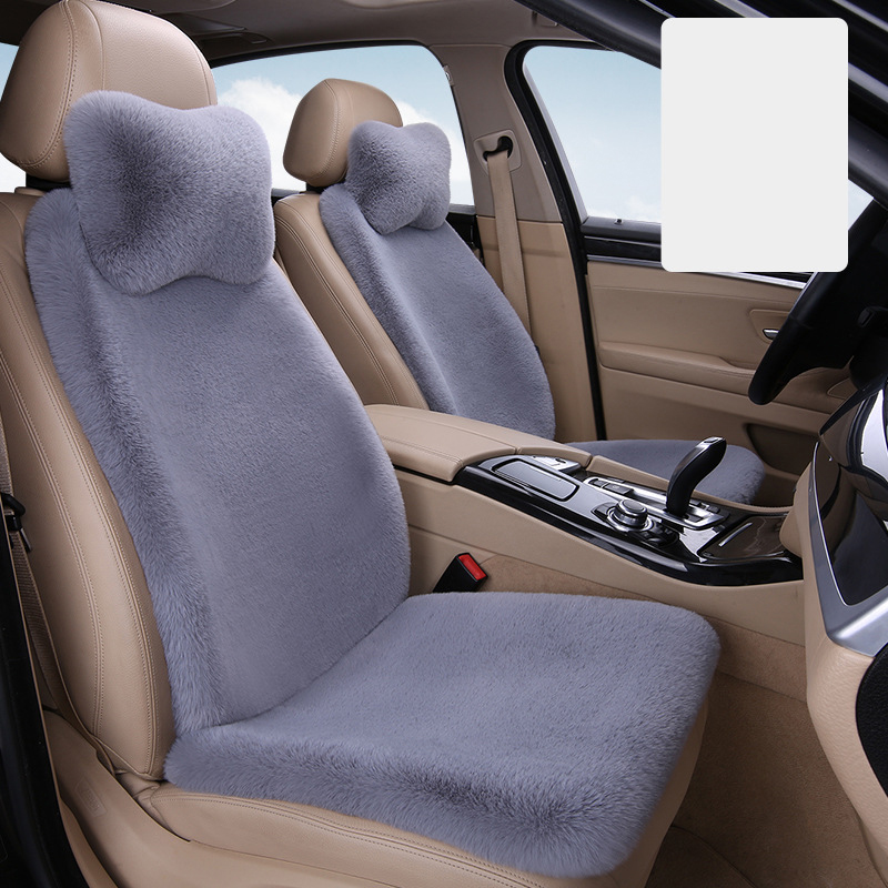 Light gray driver and passenger   2 headrests   2 waist pillows