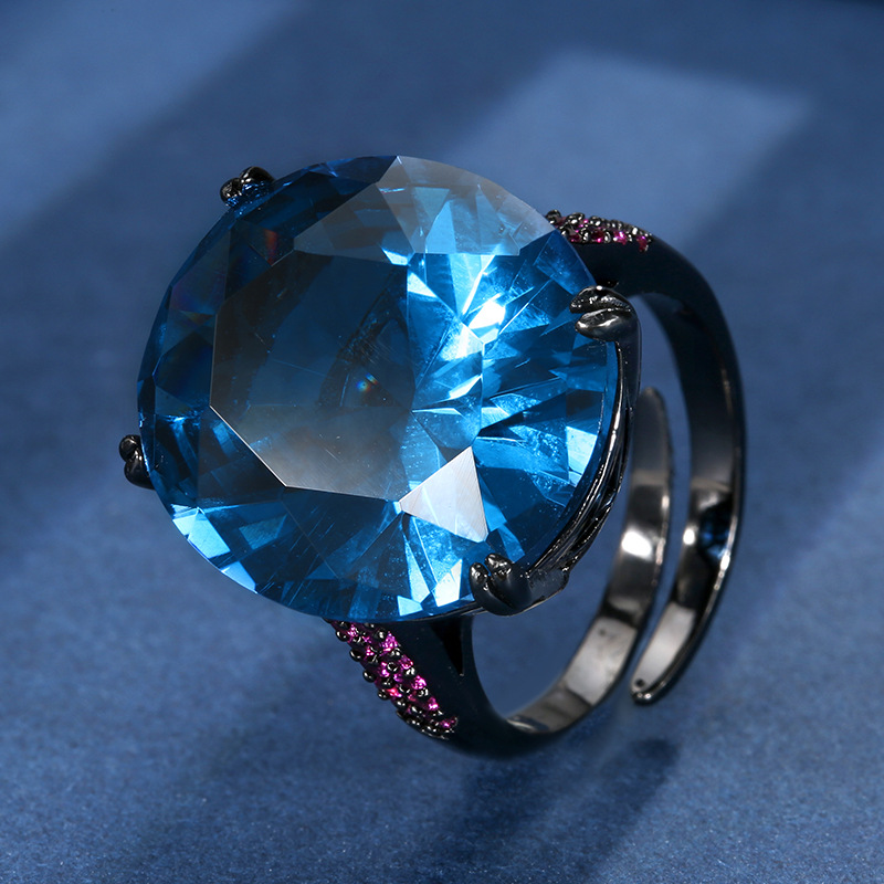 Black gold blue spinel ring
