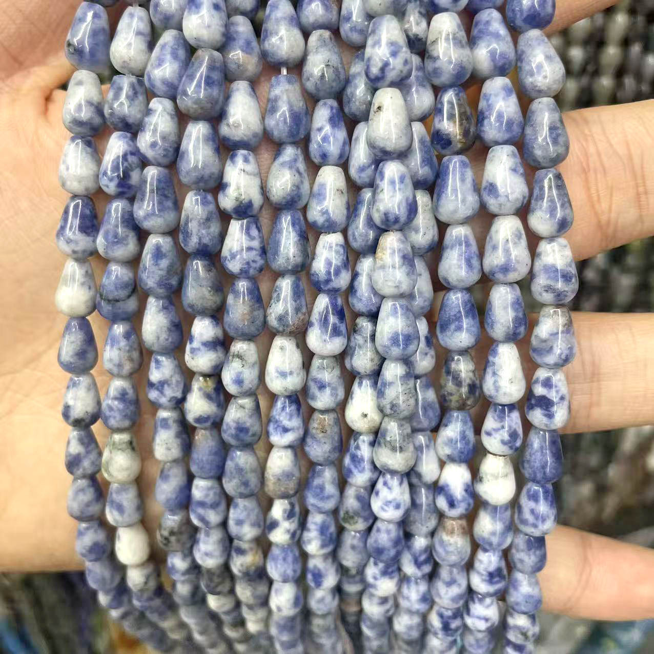 12:White and blue dot stones