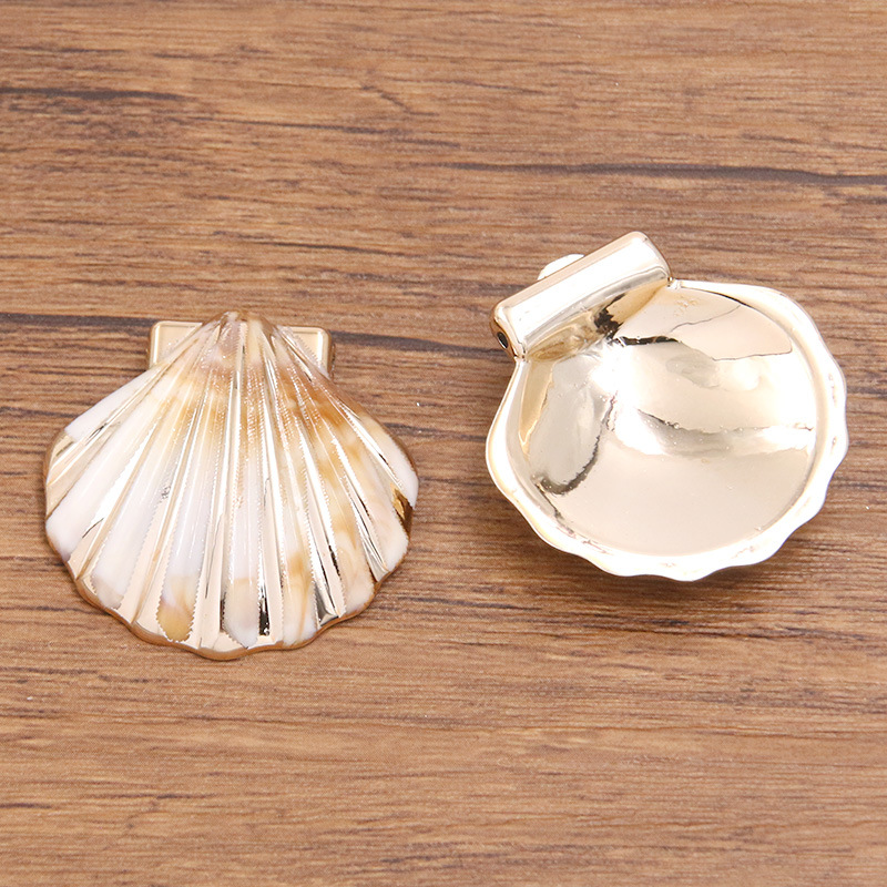 5:Shell No. 4 measures 31X32mm