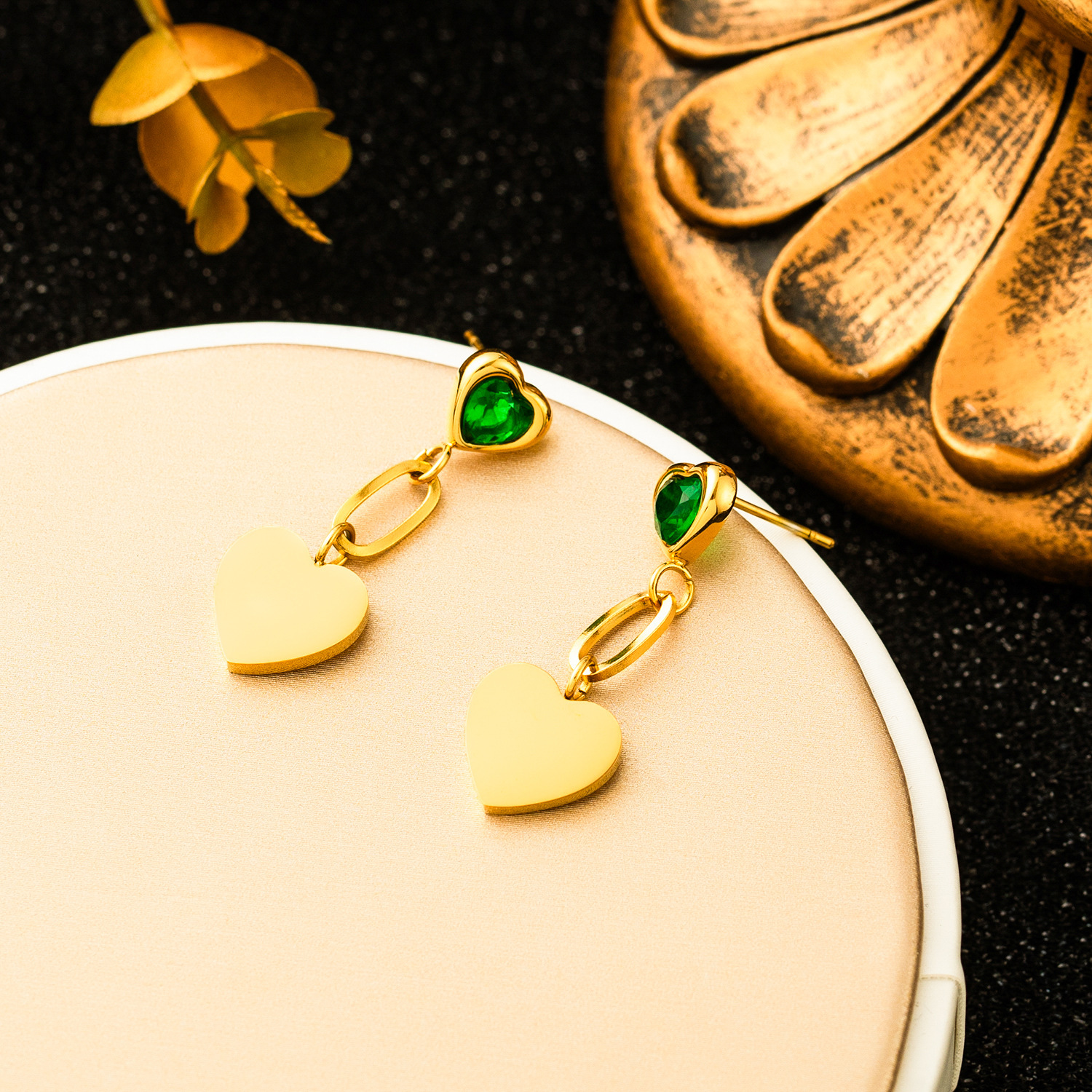 Emerald heart-shaped earrings