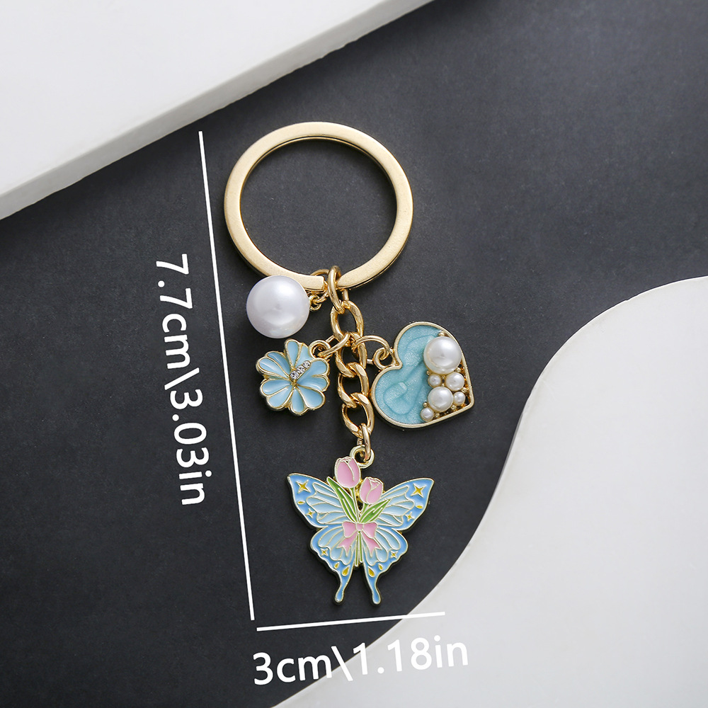 2:ER725-Drop Oil Lake Blue Love Flower Butterfly Keychain -11.2g
