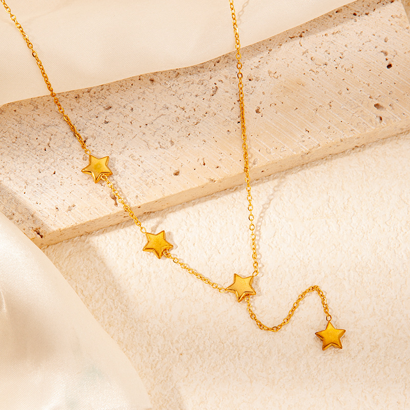 Gold star necklace