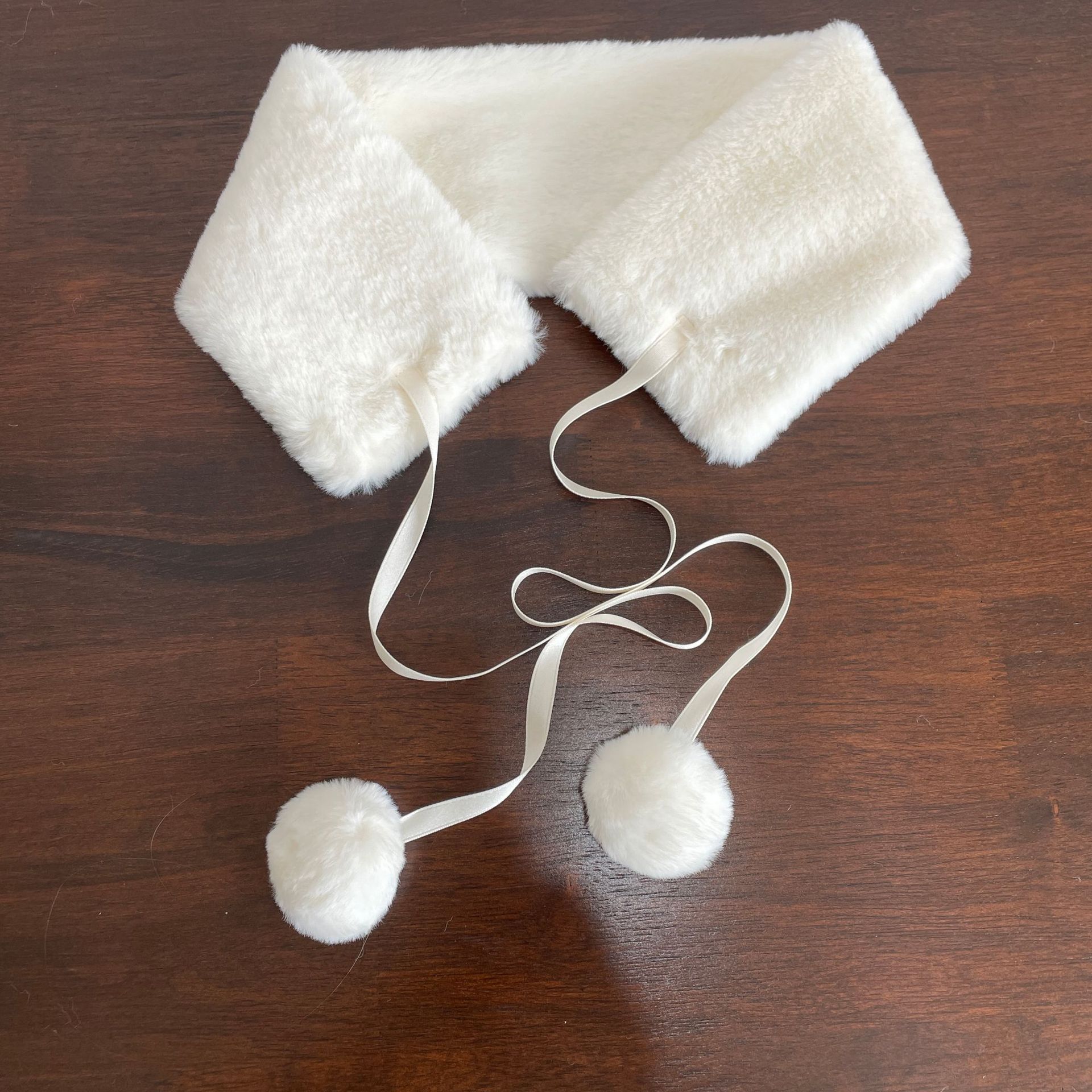 rabbit fur with ball, beige ribbon