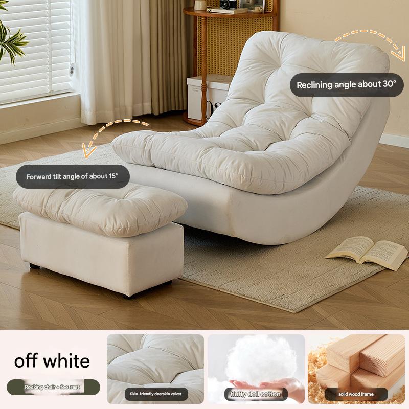 off-white chair with footrest