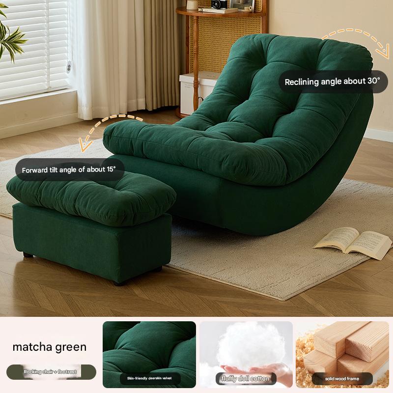 dark green chair with footrest