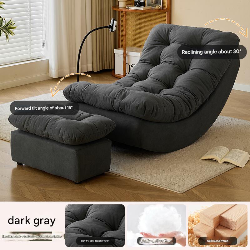 dark gray chair with mobile phone holder and footrest