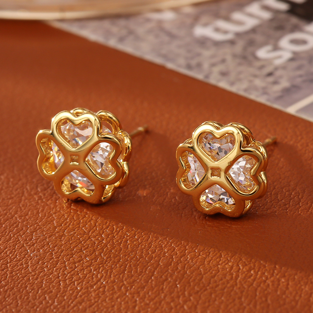 Golden white zircon four-leaf clover stud earrings