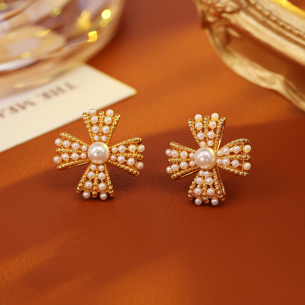 Golden millet bead four-leaf clover