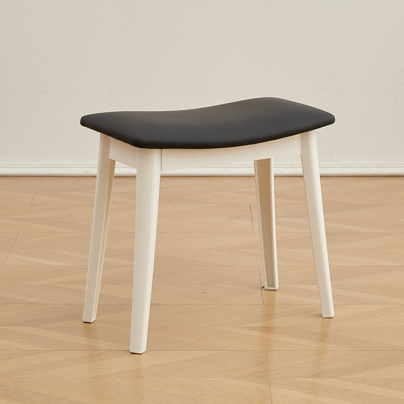 White leg black cushion