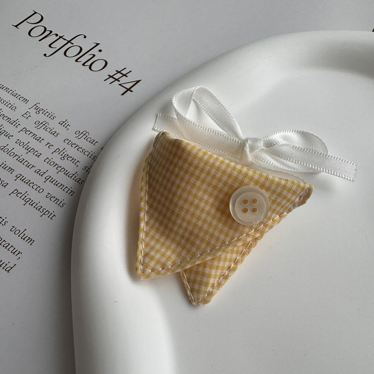 Yellow Button Check Bib