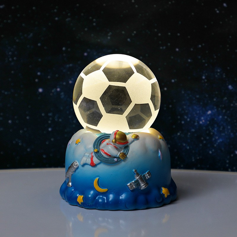 Blue astronaut rotating base - football
