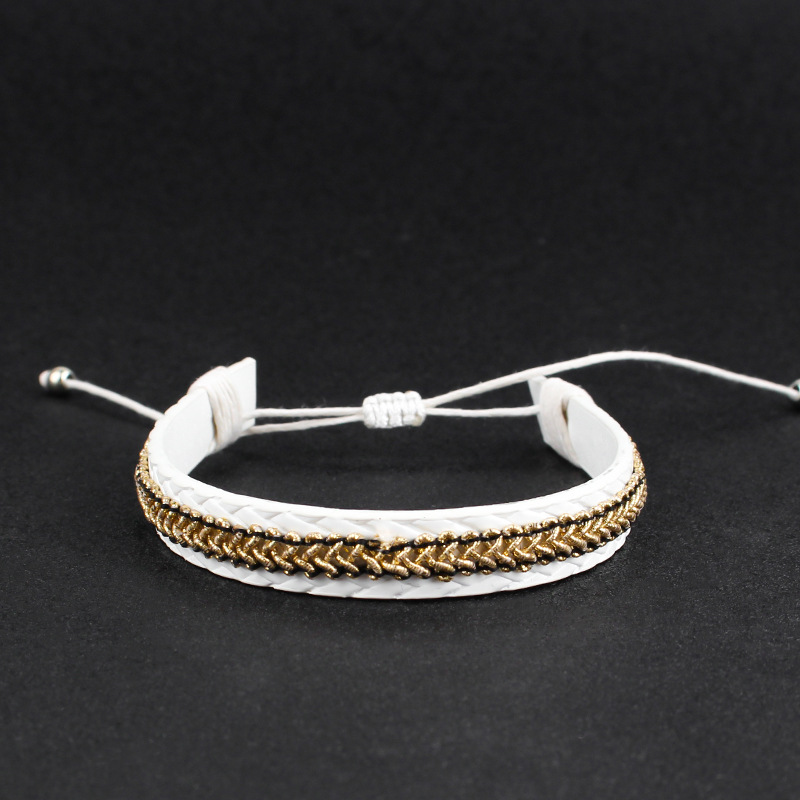 4:White embossed leather bracelet