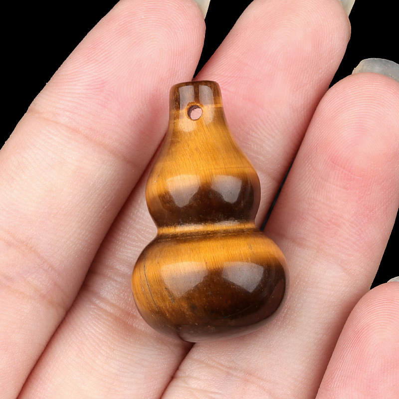 3:Tiger eye stone (with holes)