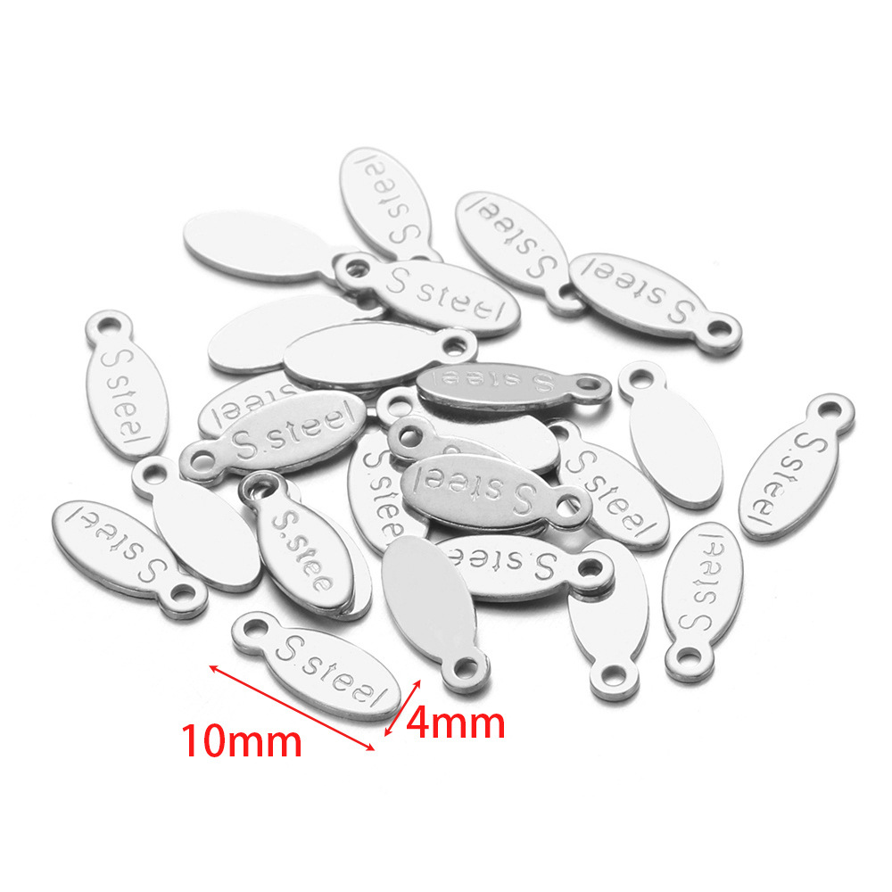 7:4*10mm engraved s'steel tail piece small tag steel color