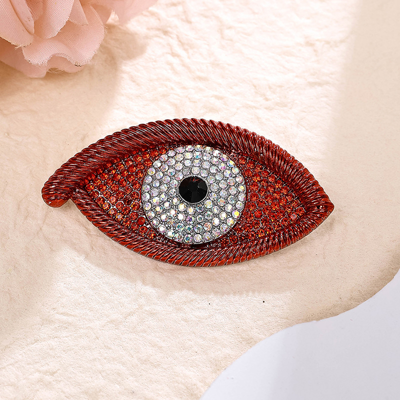 1:Red full diamond eye brooch