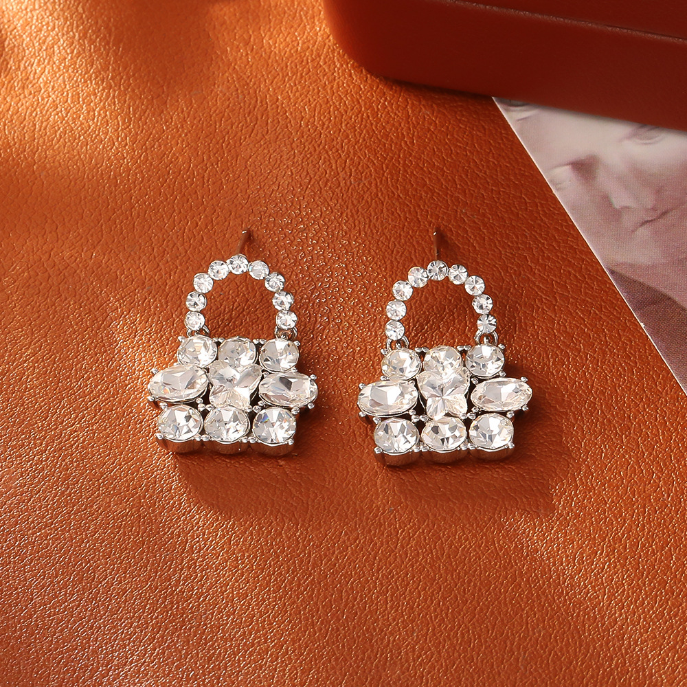 3:White butterfly zircon bag stud earrings