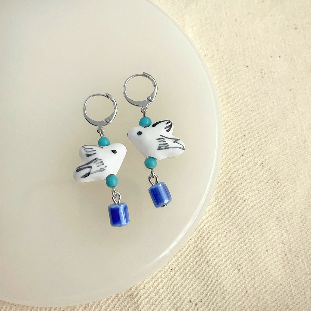 4:4198 hand-painted flying bird earrings