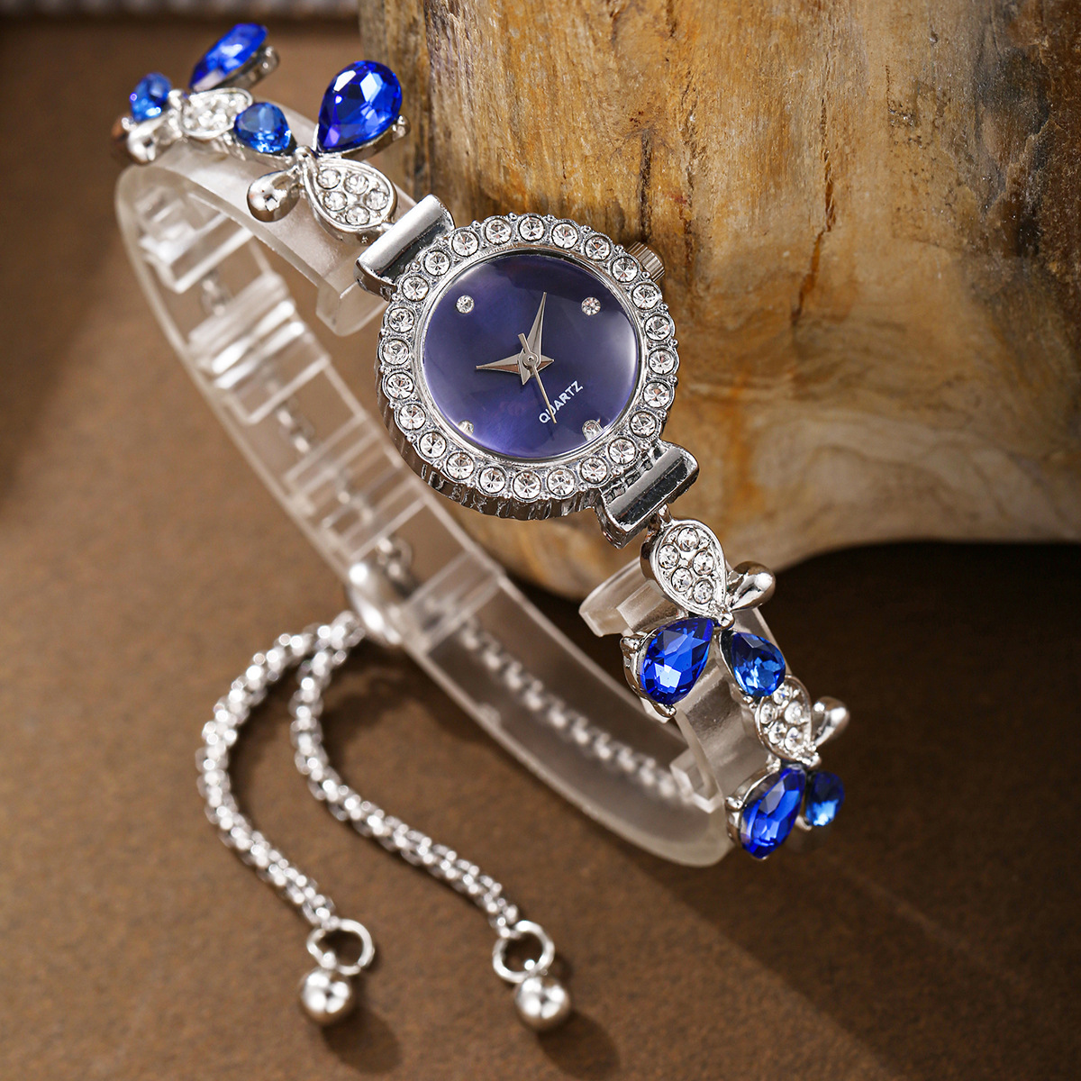 3:Silver band with blue diamond