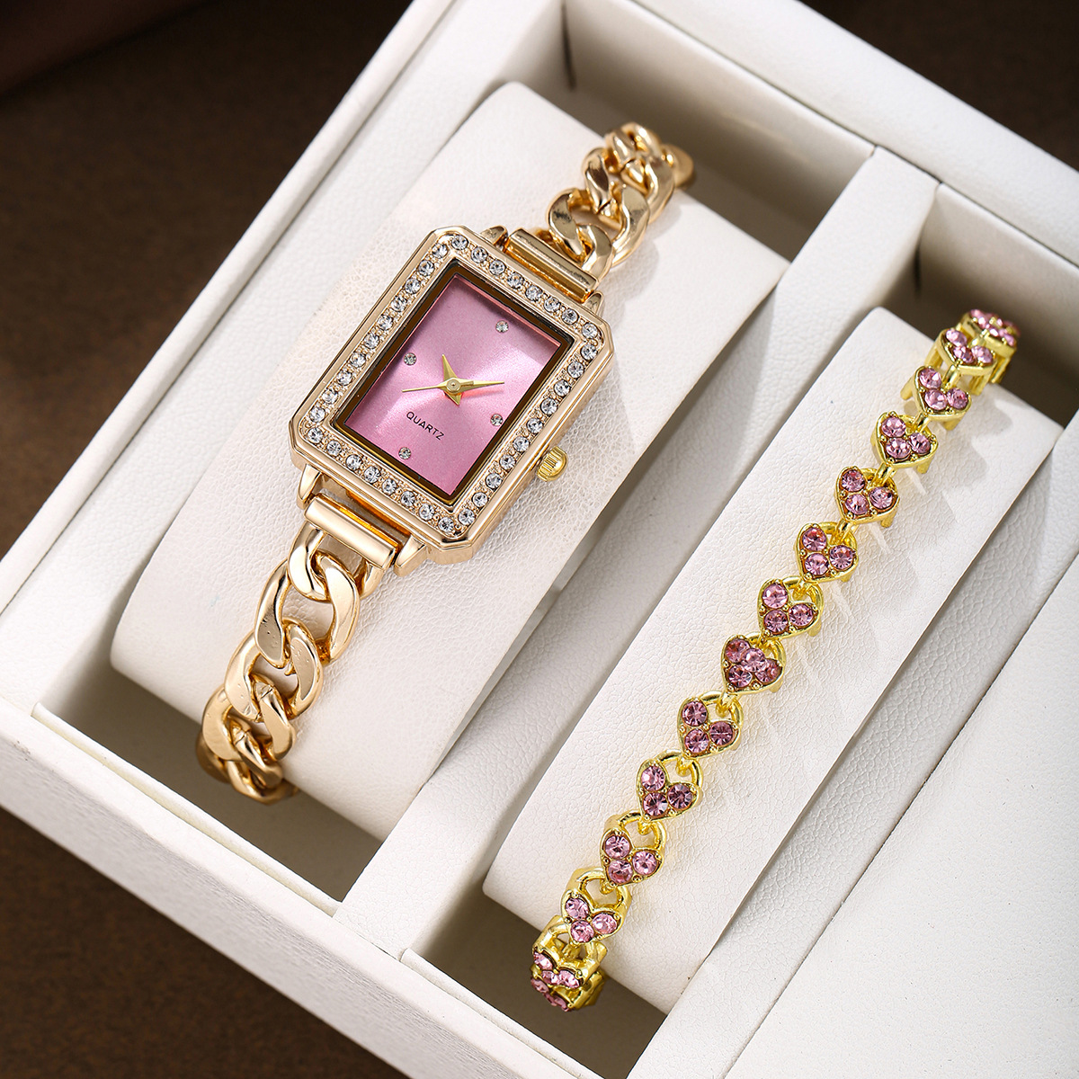 5:A set of golden pink heart-shaped bracelets