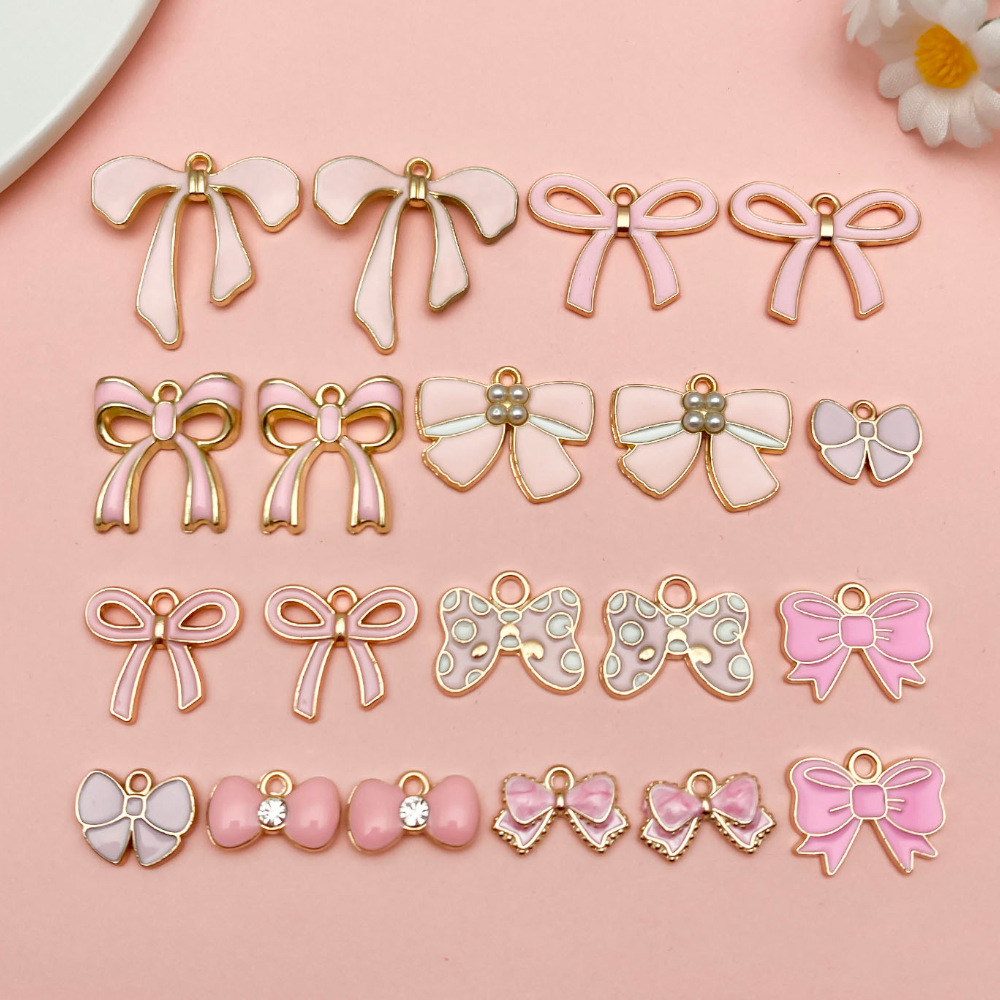 1:Sn1230-oil dripping pink bow set 10 styles 2 pieces each-25.3g