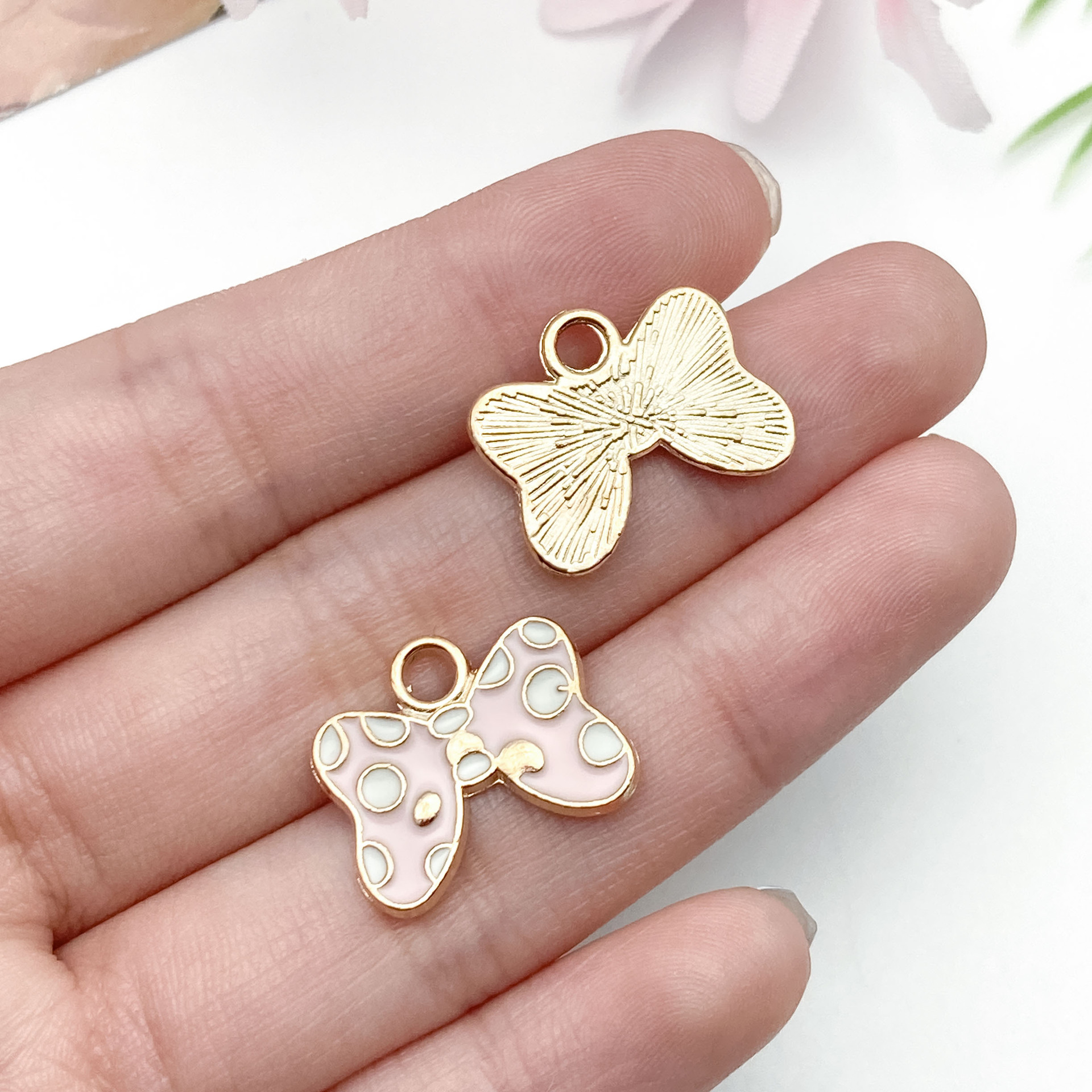 4:12097-1 pink oil dripping zinc alloy bow tie 17x14mm-1.4g