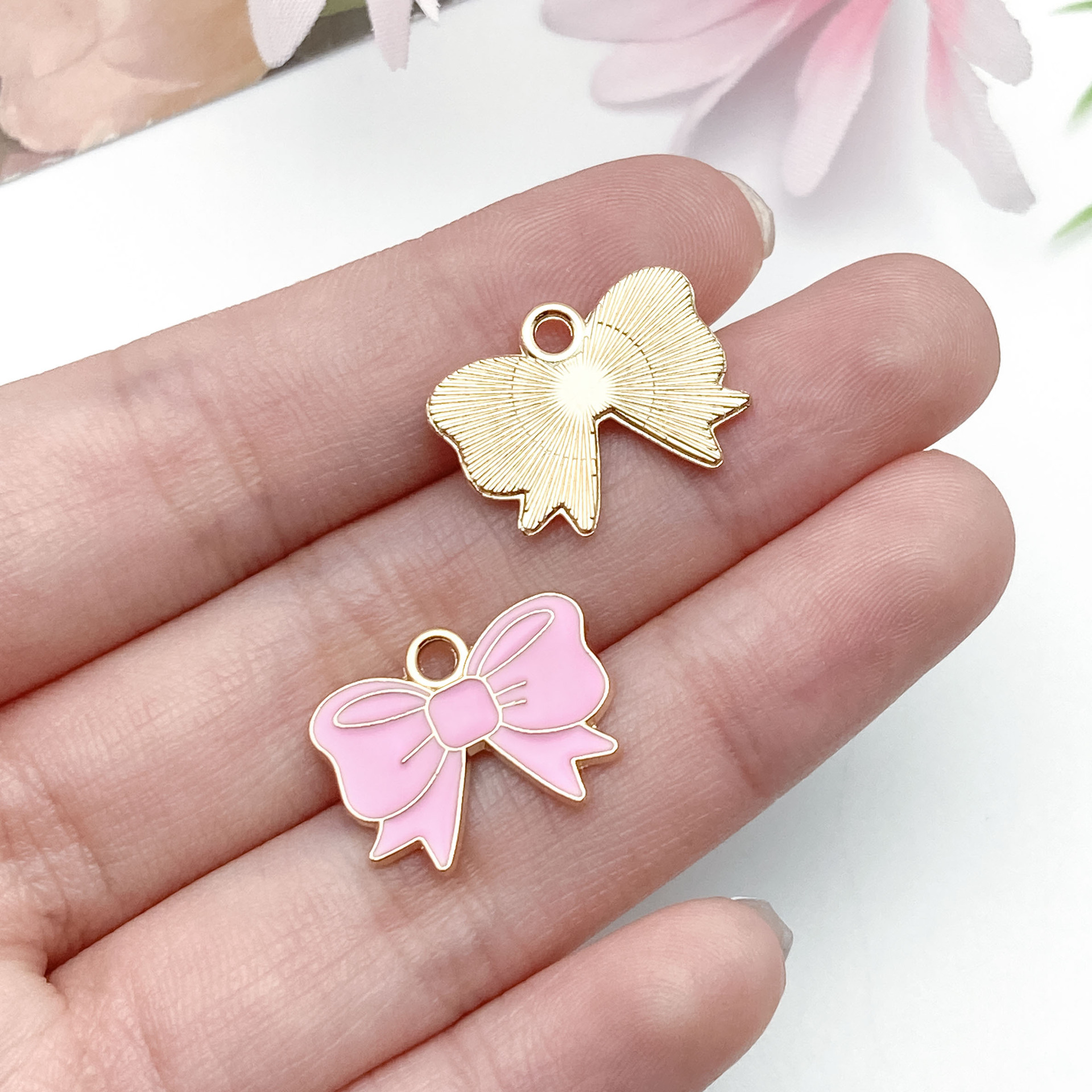 12:23243-1 oil dripping pink zinc alloy bow tie 14x18mm-1g