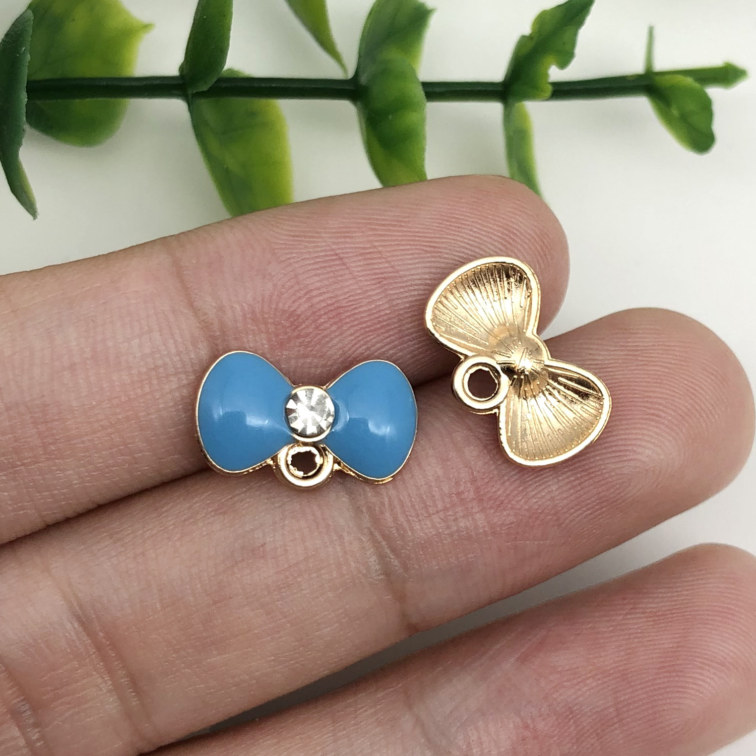 15:17530-1 lake blue oil dripping zinc alloy dot diamond bow 14.5x9mm-0.6g