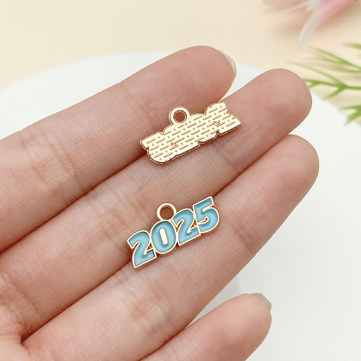 4:23338-1 kc gold blue oil dripping zinc alloy 2025 number plate 9x18mm-0.6g