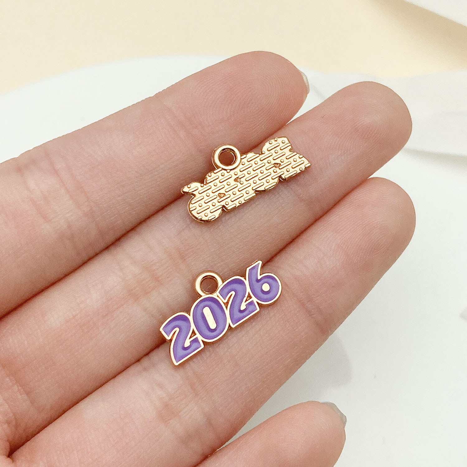 14:23348-1 kc gold purple dripping zinc alloy 2026 number plate 9x17mm-0.5g