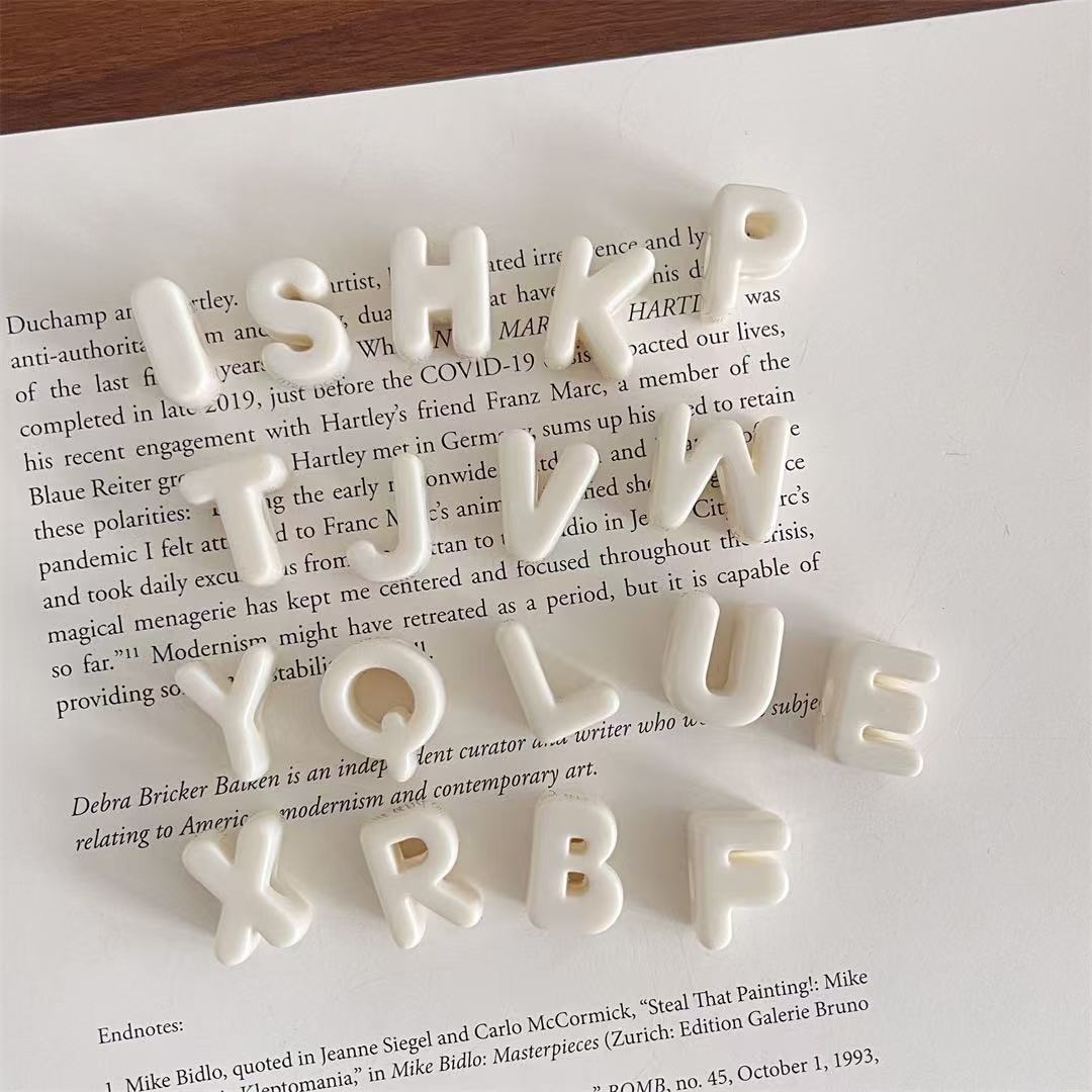 beige A-Z blanquecino