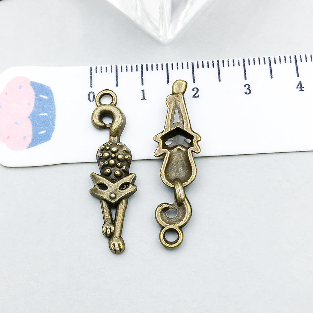 5:1 ancient green crawling cat 32*9mm