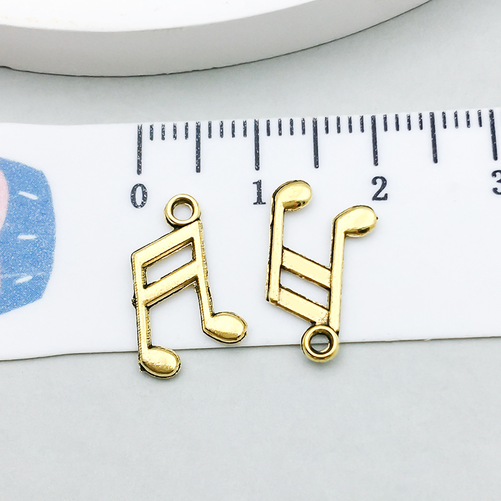 16:1 ancient gold music symbol 9*20mm