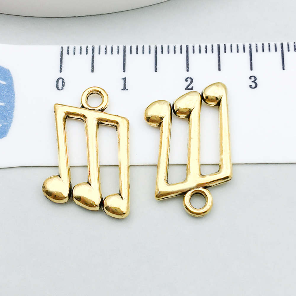 19:1 ancient gold music symbol 13*21mm