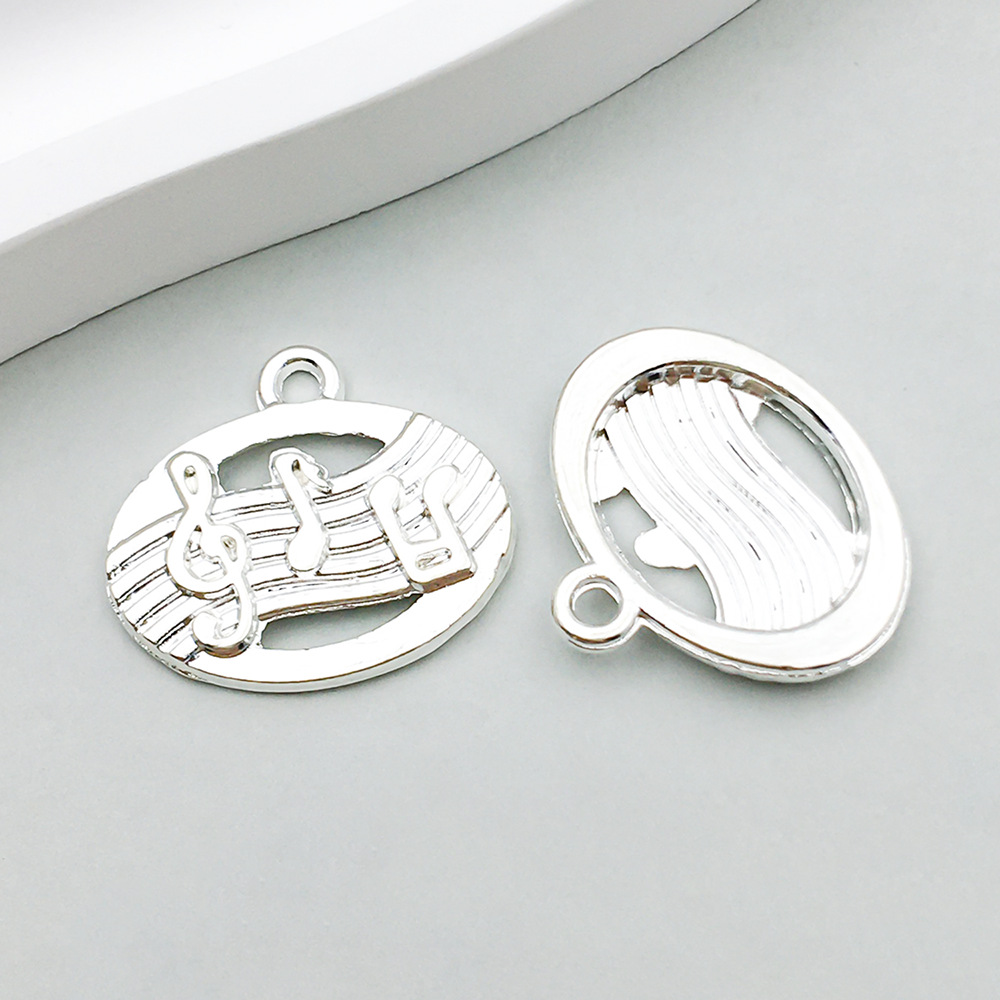 4:1 bright silver music symbol 17*19mm