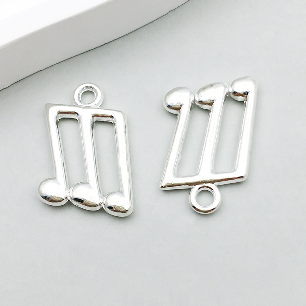 6:1 bright silver music symbol 13*21mm