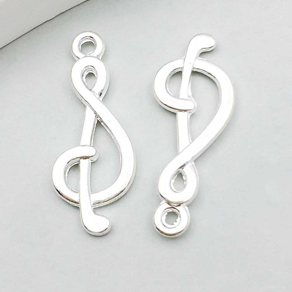 9:1 bright silver music symbol 10*27mm